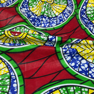 Waxed African Printed Cotton - Circles - Red / Green / Yellow / Blue