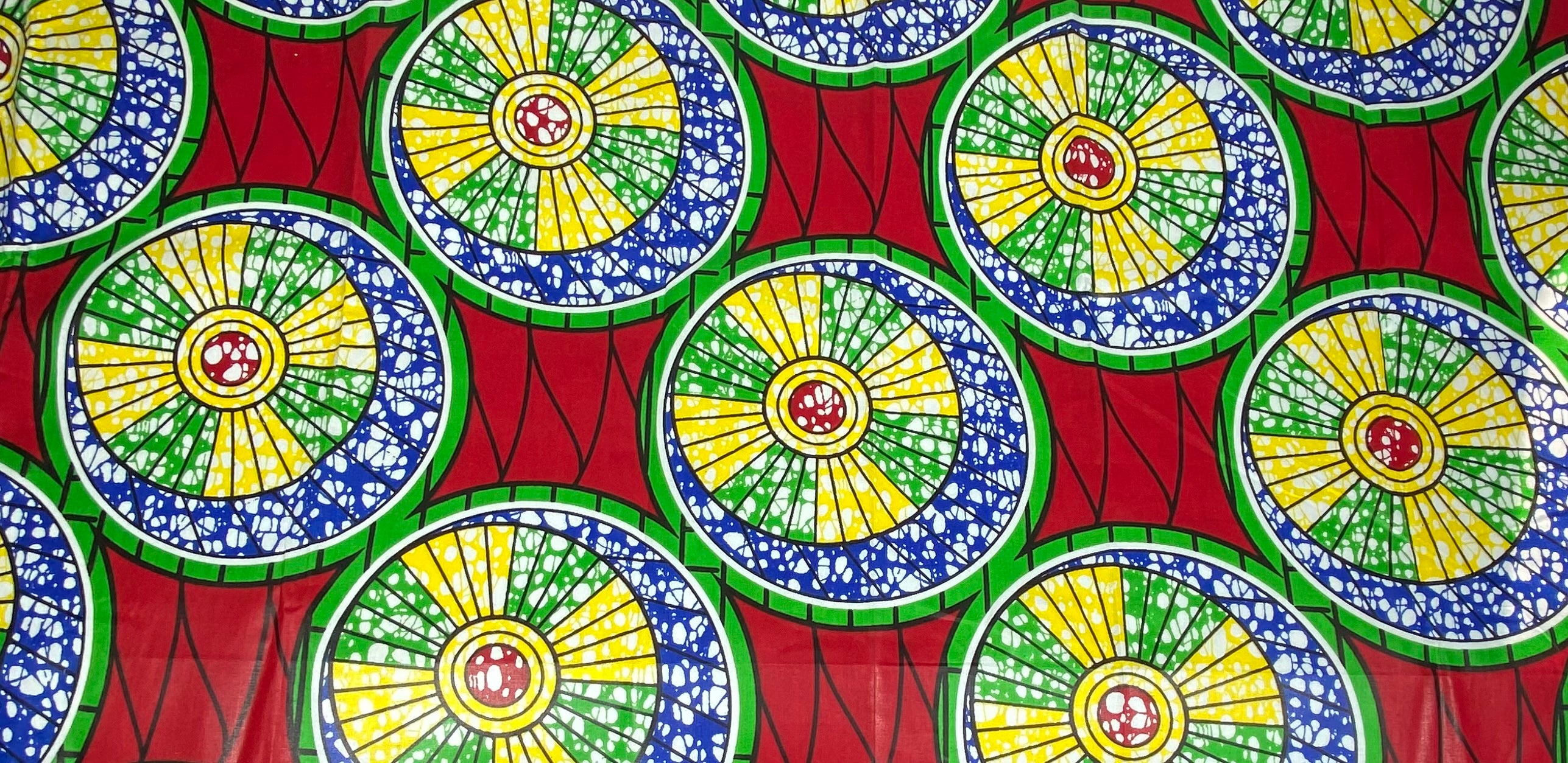 Waxed African Printed Cotton - Circles - Red/Green/Yellow/Blue